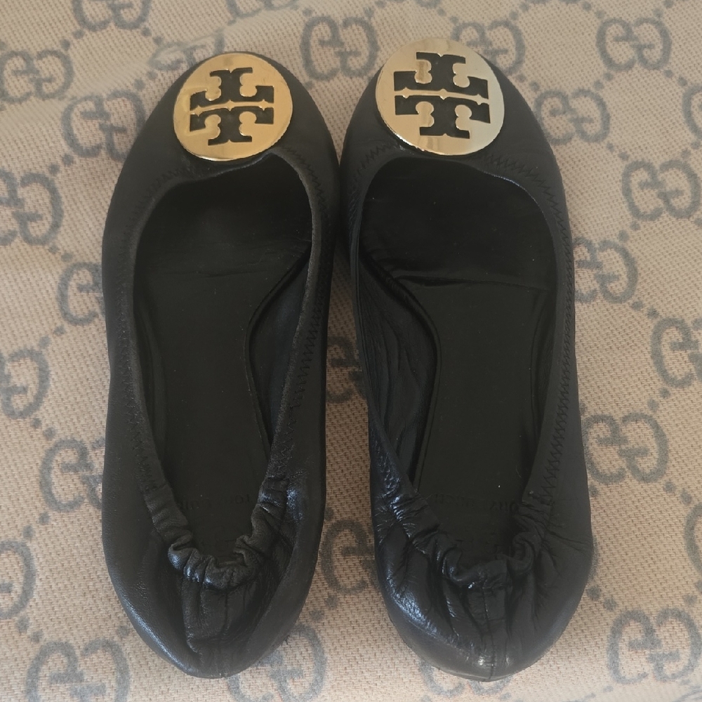 Tory Burch Black Flats with Gold Emblem